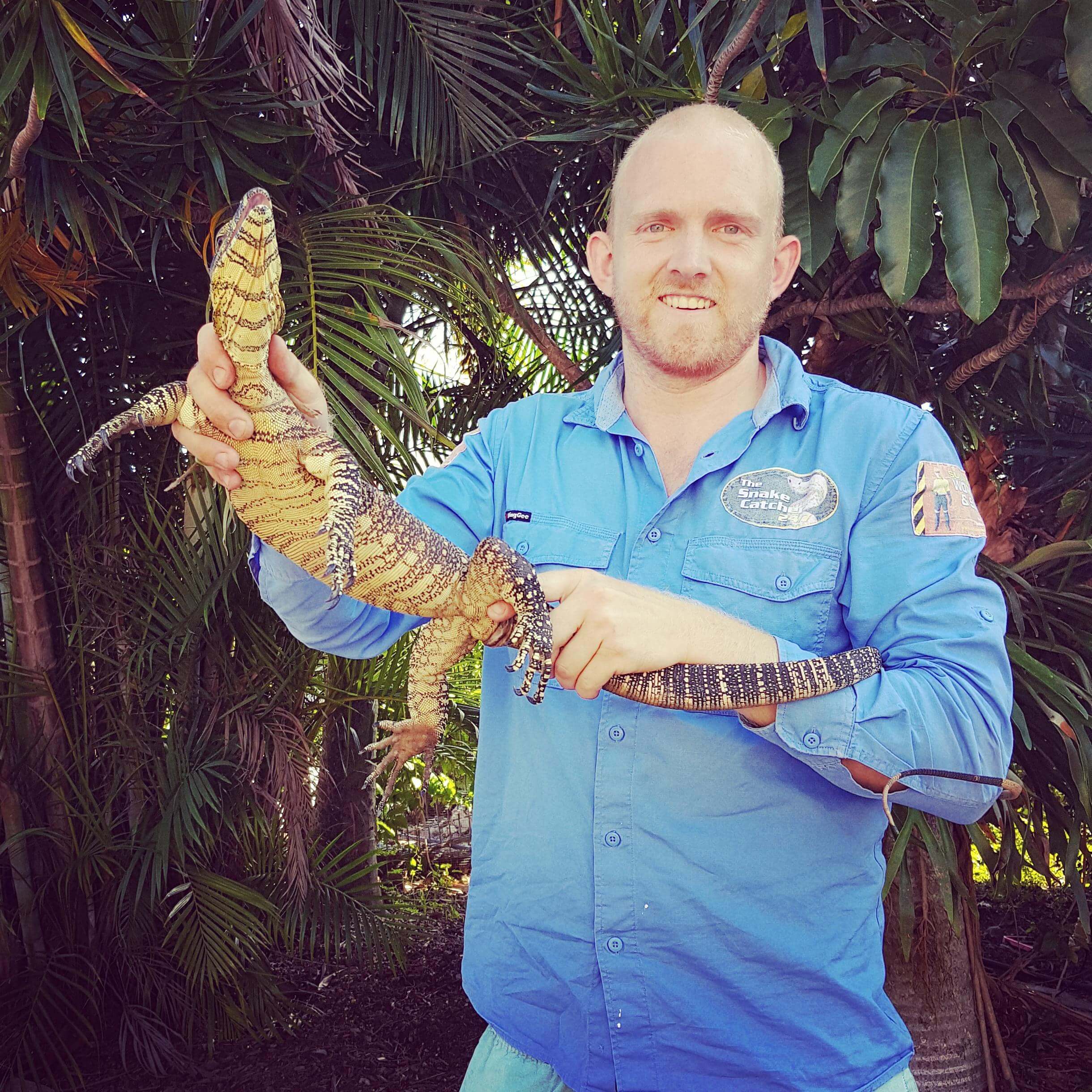 Stuart McKenzie holding a Lizard