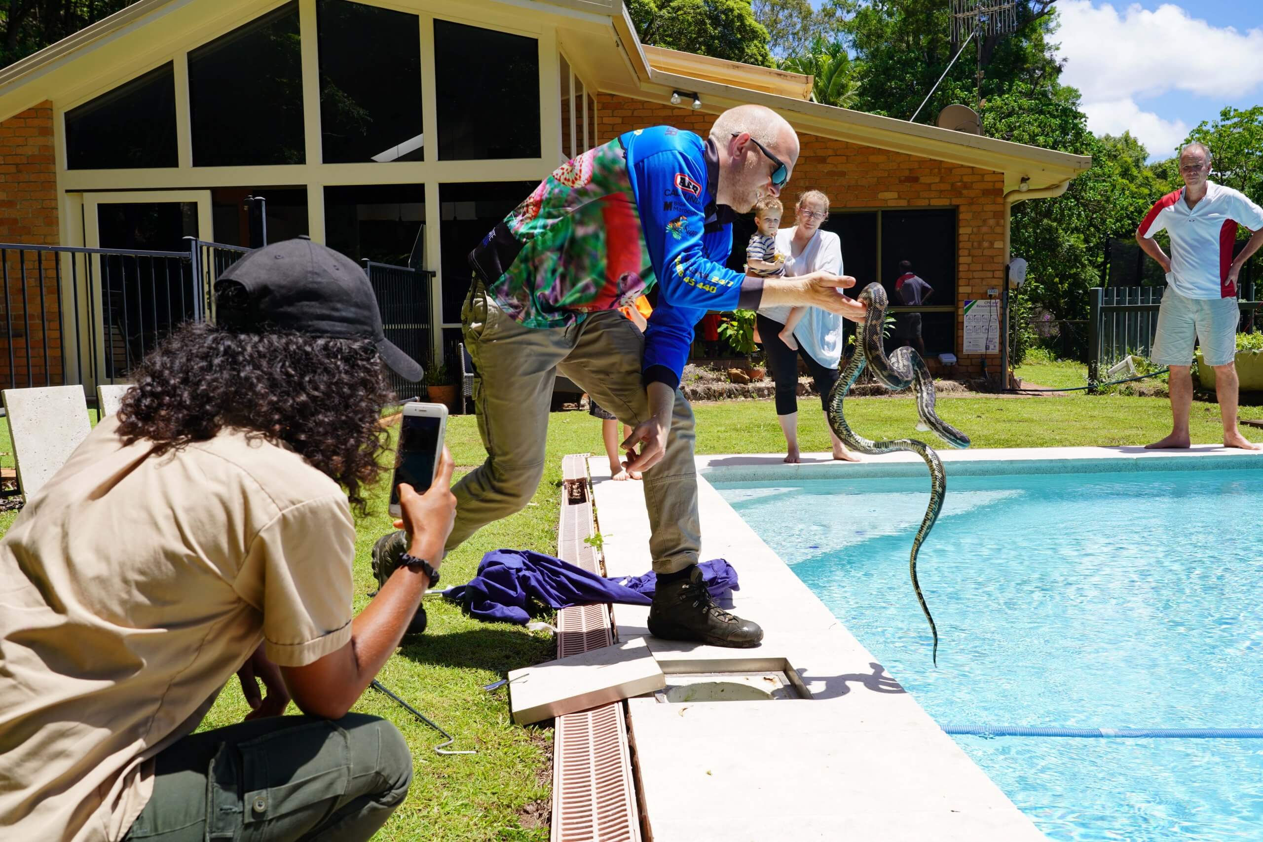 Watching on a python is pulled out of pool